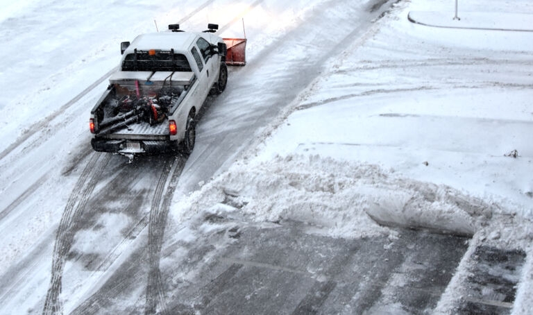 Snowplow in parking lot